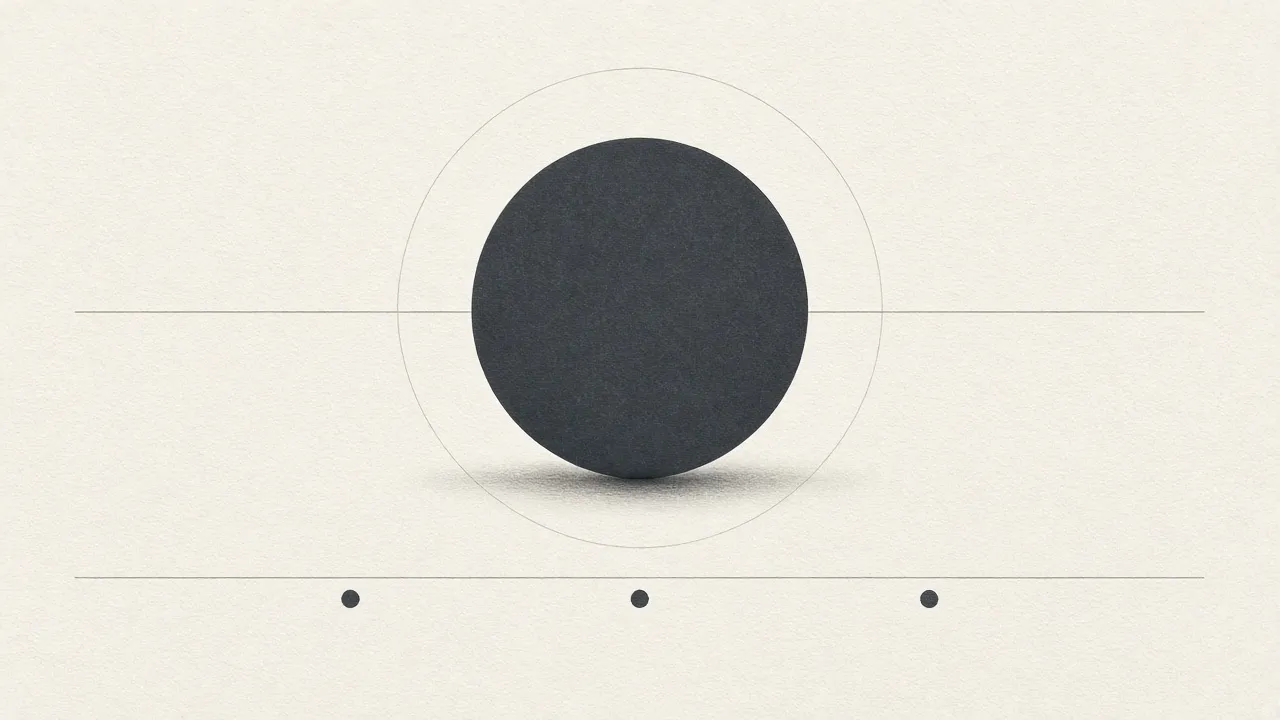 A charcoal disc inside a faint circle, above a dotted line.